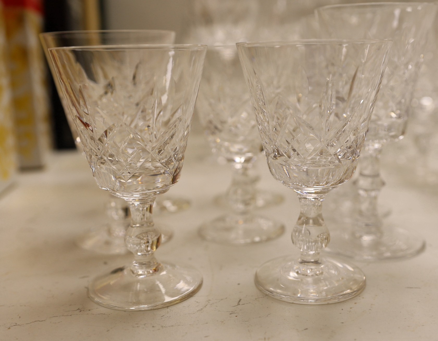 A large collection of suites of mostly Stuart cut glass, including, wine glasses, spirits glasses and jugs